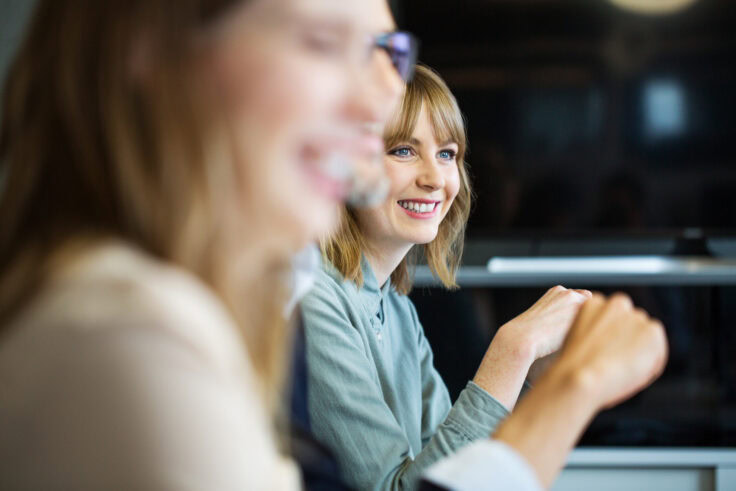 Female professional in meeting